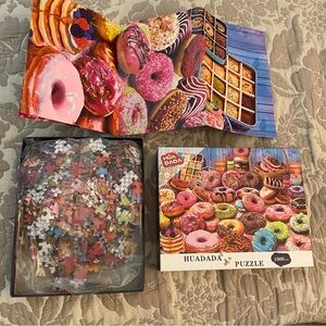 Multi-coloured donut 1000 piece puzzle 
Easy fit pieces
